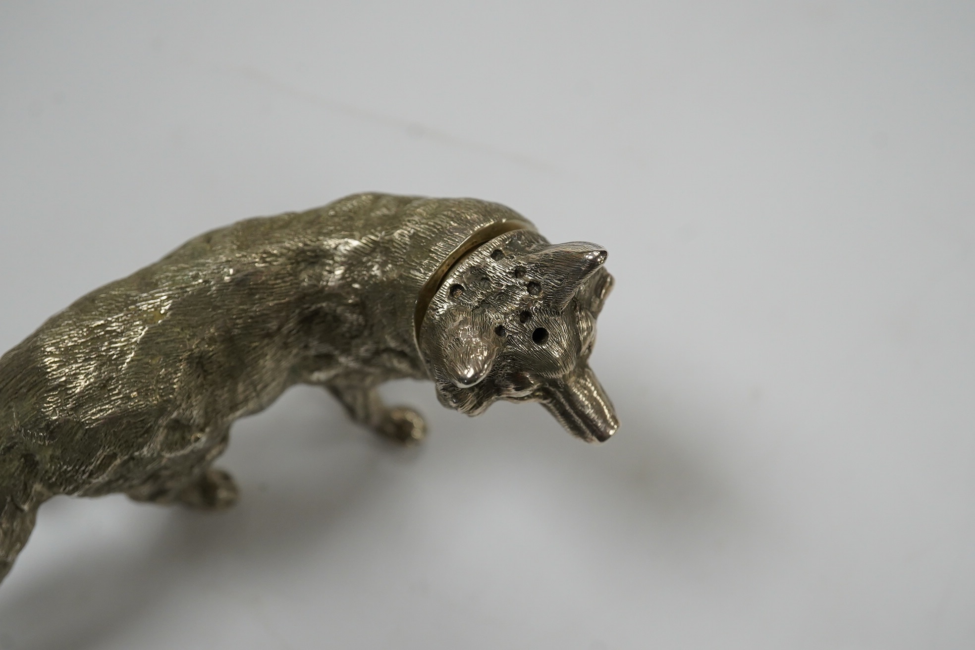 An Elizabeth II novelty silver condiment, modelled as a free standing fox, maker SMD Castings?, London, 1970, length 10.7cm, 4.3oz. Condition - fair to good